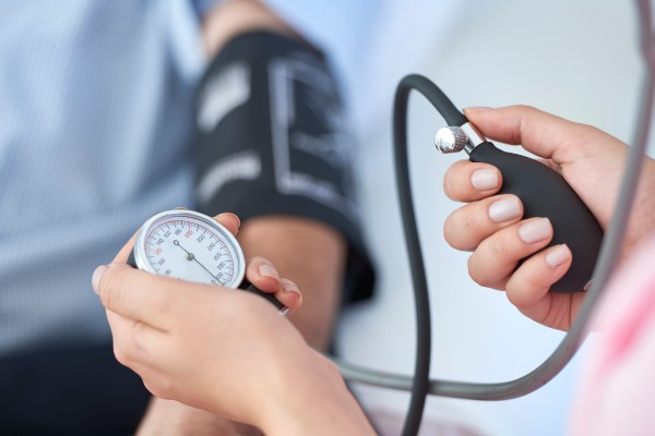 image of patient having blood pressure taken